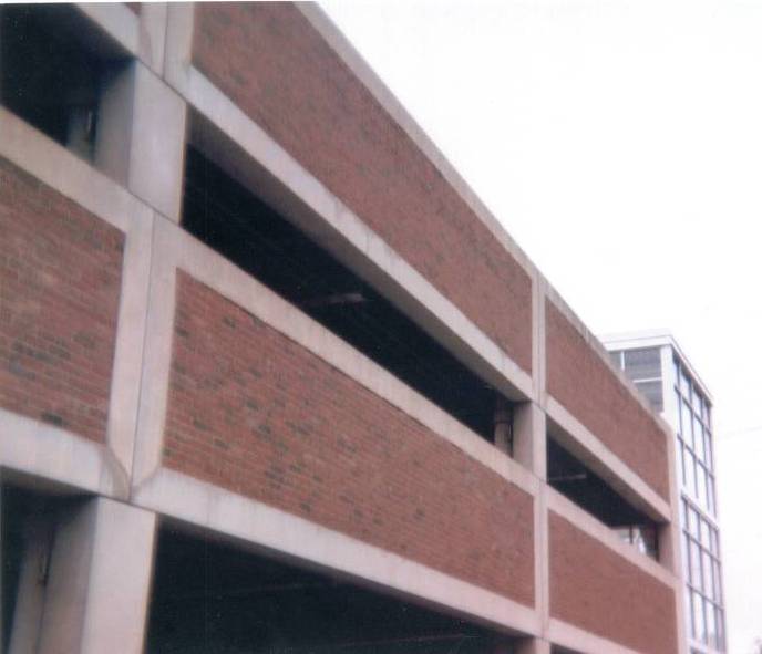 Parking garage with mostly brick exterior in Auburn, Maine